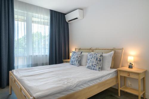 Katil atau katil-katil dalam bilik di Onda apartment - Coral Residence complex with parking & pool