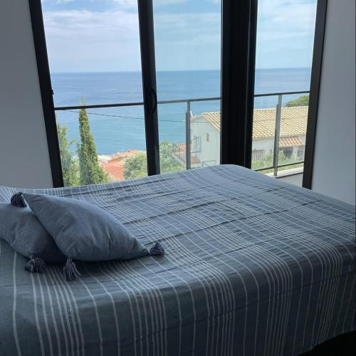 A bed or beds in a room at Apartment SEA VIEW