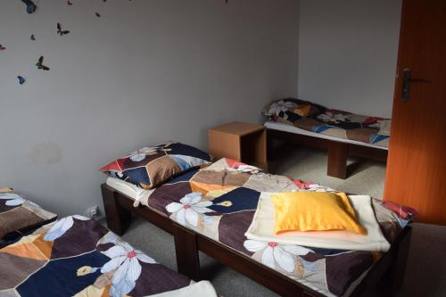 A bunk bed or bunk beds in a room at Apartament Czos
