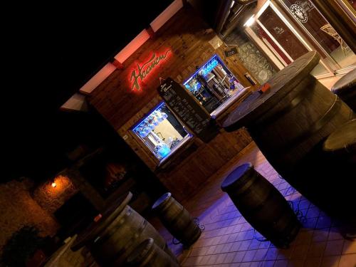 an overhead view of a bar with barrels on the floor at Albergo Casa Este in Brenzone sul Garda