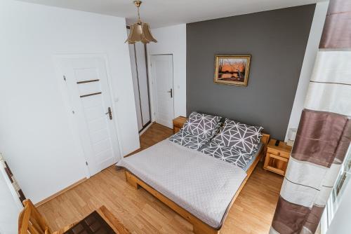 Postel nebo postele na pokoji v ubytování Willa Halina