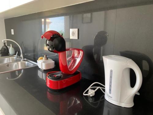 Coffee and tea making facilities at Apartment SEA VIEW