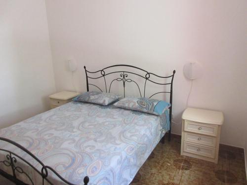Ein Bett oder Betten in einem Zimmer der Unterkunft Antonella House