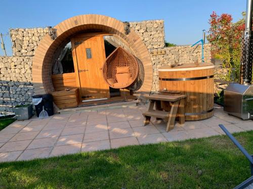 Winter escape luxury hobbit house with hot tub