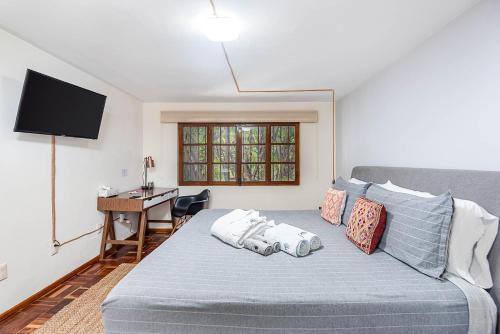 Postel nebo postele na pokoji v ubytování Finca Coyoacán