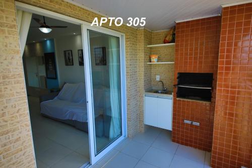 Dapur atau dapur kecil di LINDO NOVISSIMO e PÉ NA AREIA
