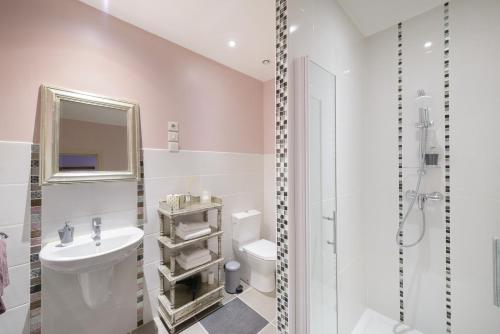 Vonios kambarys apgyvendinimo įstaigoje La Closerie Saint-Vincent, chambres d'hôtes Amboise