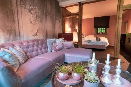 Posezení v ubytování LÖFFELMÜHLE BOUTIQUE BED AND BREAKFAST