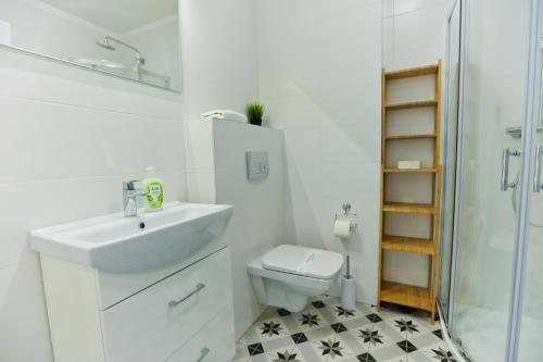 Koupelna v ubytování M&K Apartament Słomkowe Kapelusze - Sobieszewo, Wyspa Sobieszewska