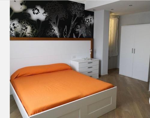 Un pat sau paturi într-o cameră la Borgo Piccaratico