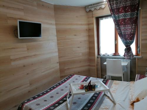 Télévision ou salle de divertissement dans l'établissement Le stelle 1400 - Cabanaira Condominio