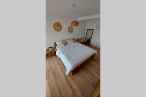 Katil atau katil-katil dalam bilik di EL ALEMÁ I. Apartamento de diseño en Gandía.