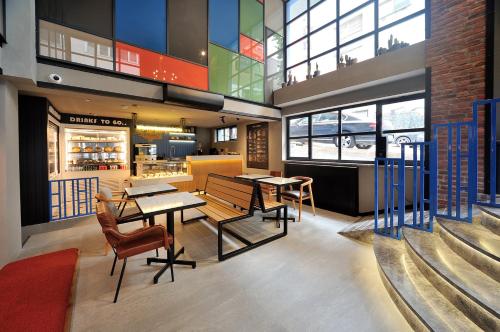 a restaurant with tables and chairs in a building at Stayso by Cloud7 Hotels in Istanbul