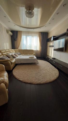 En eller flere senge i et værelse på Просторные апартаменты