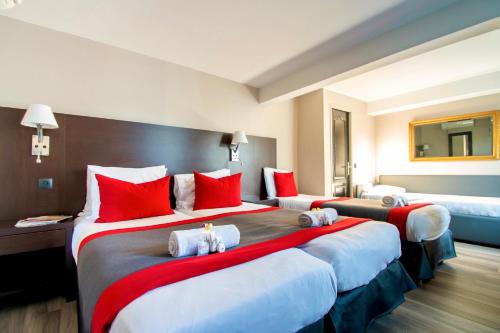 Katil atau katil-katil dalam bilik di Hotel Migny Opéra Montmartre