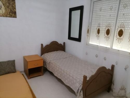 Ein Bett oder Betten in einem Zimmer der Unterkunft Hergla_AFH_Beach