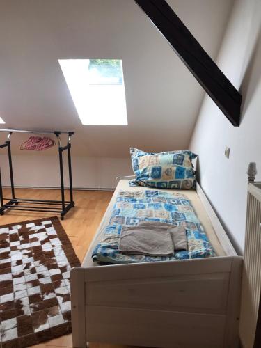 a bedroom with a bed in a attic at Apartmany Lend in Lend