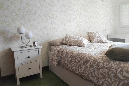 A bed or beds in a room at Apartamento BellAloe