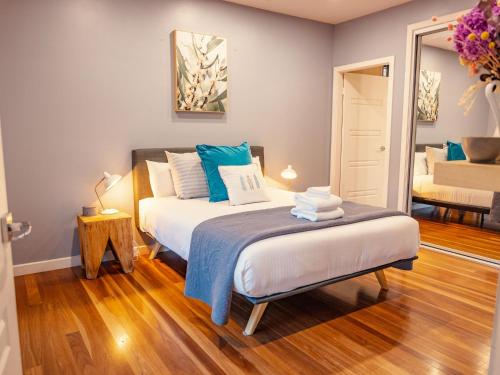 Postel nebo postele na pokoji v ubytování Fig Tree Luxury Guest House