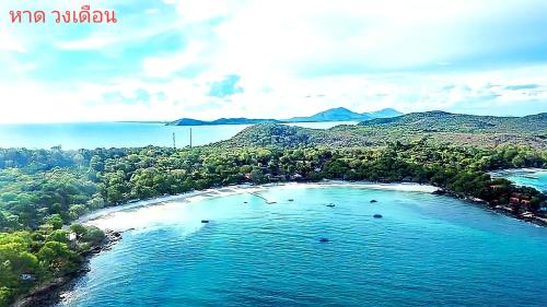 an aerial view of a beach with trees and water at Tom Pizza Resort in Ko Samed