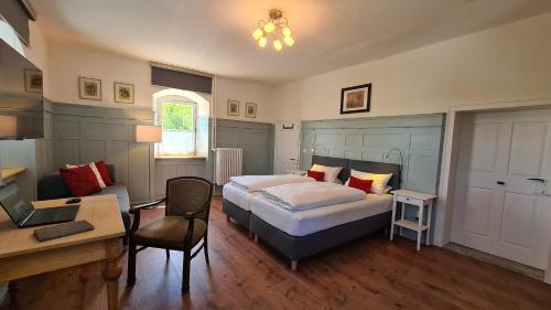 Ένα ή περισσότερα κρεβάτια σε δωμάτιο στο Landhausgarten Bunzmann
