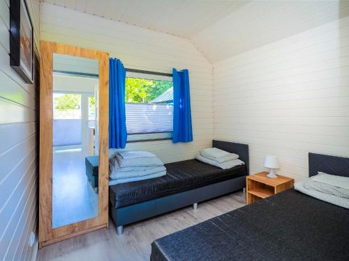 Postel nebo postele na pokoji v ubytování Balticus