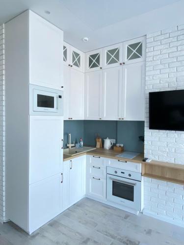 Mediterranean style apartment sea viewにあるキッチンまたは簡易キッチン