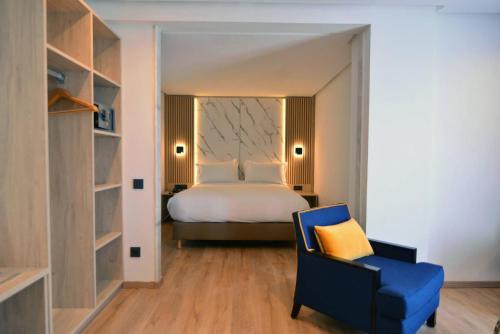 Katil atau katil-katil dalam bilik di Rihab Hotel