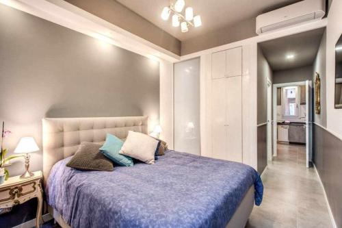 En eller flere senge i et værelse på Original House in Trastevere