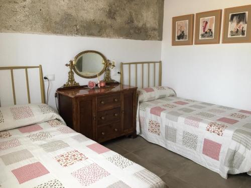 Ένα ή περισσότερα κρεβάτια σε δωμάτιο στο Eralta