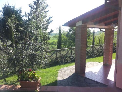 a view from the outside of a house with a patio at B&B La Piaggia in Montemerano