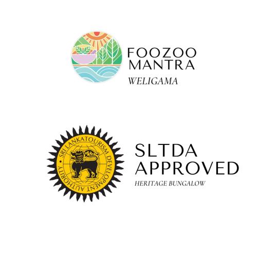 Foozoo Mantra Weligamaに飾ってある許可証、賞状、看板またはその他の書類