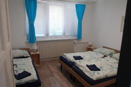 Postel nebo postele na pokoji v ubytování Penzion jaký svět neviděl