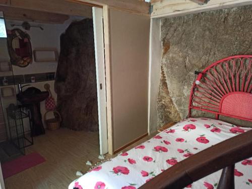 Postel nebo postele na pokoji v ubytování Gîte les coquelicots de Retourtour