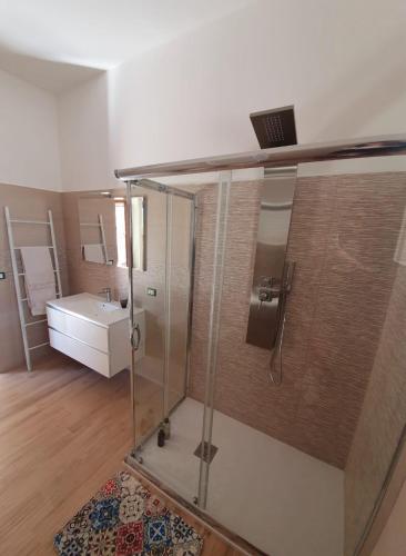 a bathroom with a shower and a sink at Coco' Country House Lecce in Lecce
