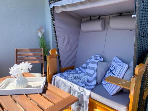 Postel nebo postele na pokoji v ubytování Ferienwohnung Strandhoch