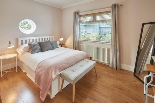 a bedroom with a bed and a window at Host & Stay - Burnsyde Beach House in Saltburn-by-the-Sea