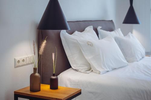 A bed or beds in a room at Amodara Boutique Villas-Naxos Boutique Luxury Private Villas