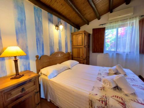 Uma cama ou camas num quarto em Quinta do Mar - Country & Sea Village