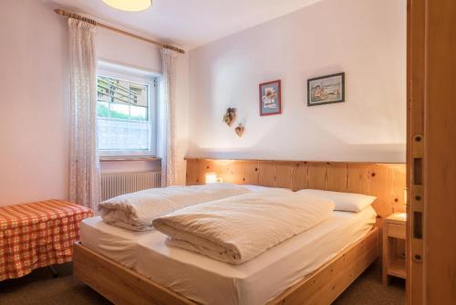 Ein Bett oder Betten in einem Zimmer der Unterkunft Casa Lorenz 2