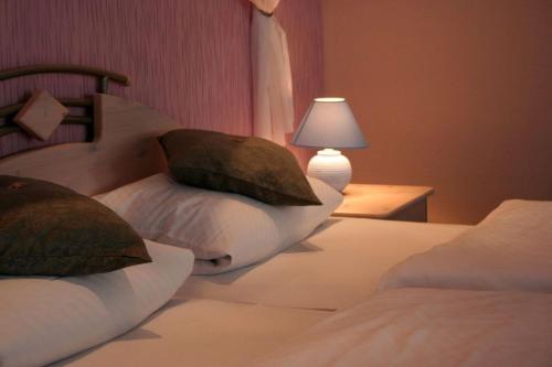 Ένα ή περισσότερα κρεβάτια σε δωμάτιο στο Hotel Seewiefken