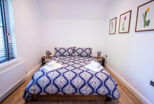 Katil atau katil-katil dalam bilik di Southgate Coach House