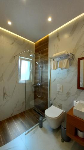 Koupelna v ubytování 6 Milje Hotel