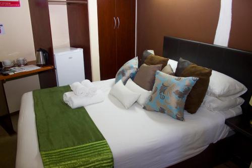 Postel nebo postele na pokoji v ubytování Echo Garden Guesthouse