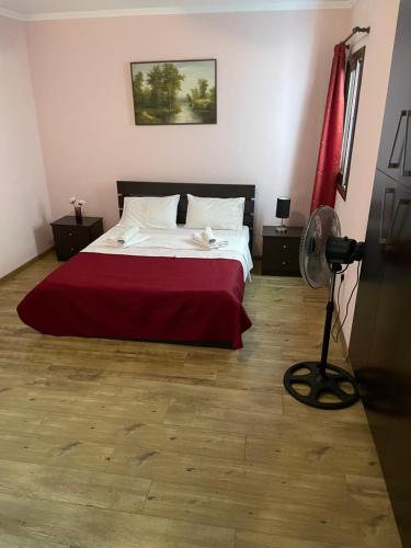 Postel nebo postele na pokoji v ubytování Softades Cottage