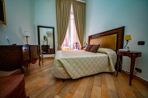 Postel nebo postele na pokoji v ubytování Hotel Lanfipe Palace