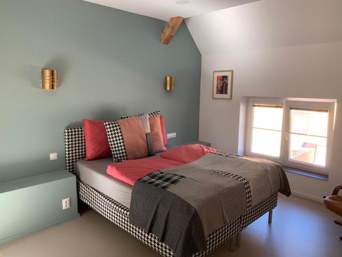 a bedroom with a bed and a window at Fox in HoÅ¡Å¥ka