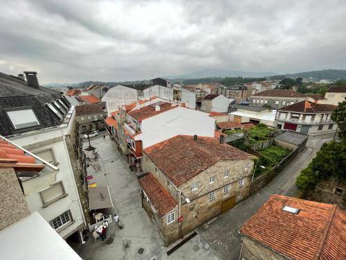 an overhead view of a city with buildings at Altamira in Caldas de Reis