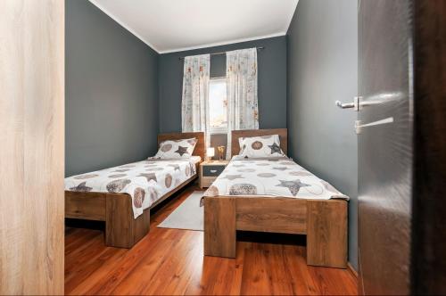 Ein Bett oder Betten in einem Zimmer der Unterkunft Apartment Cave