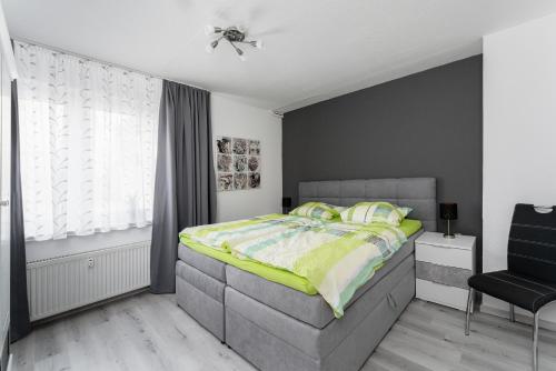 Ένα ή περισσότερα κρεβάτια σε δωμάτιο στο Ferienhaus Usseln